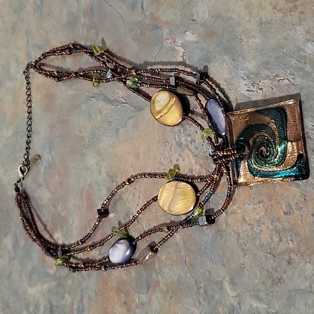 Beautiful beaded necklace with square brown and green pendant